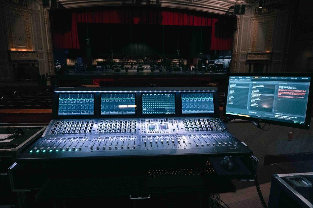 avid sound console with stage in the background