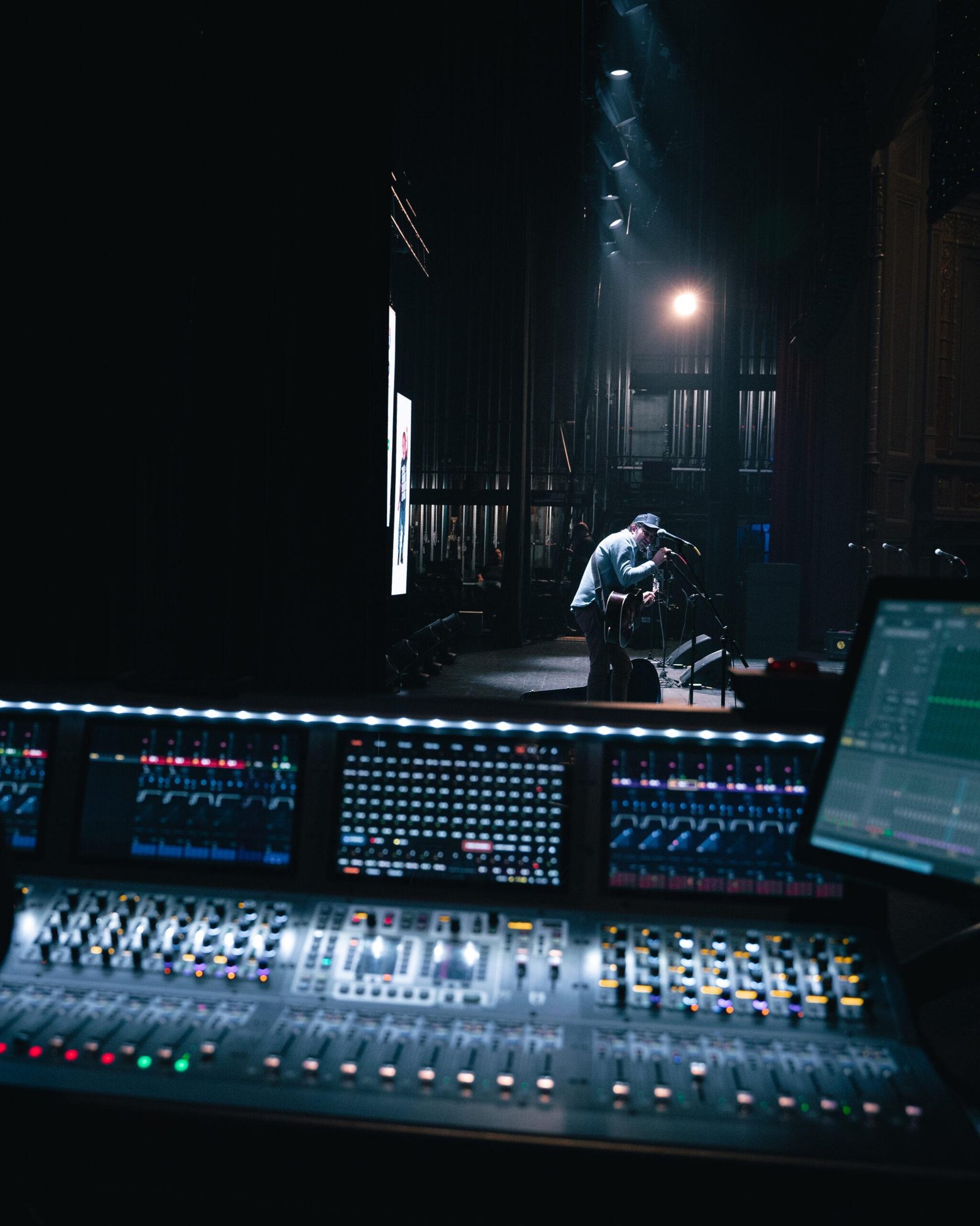 Live concert stage with professional audio setup